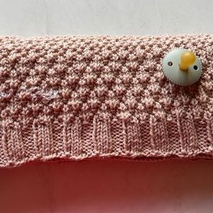 Handmade knit baby blanket.